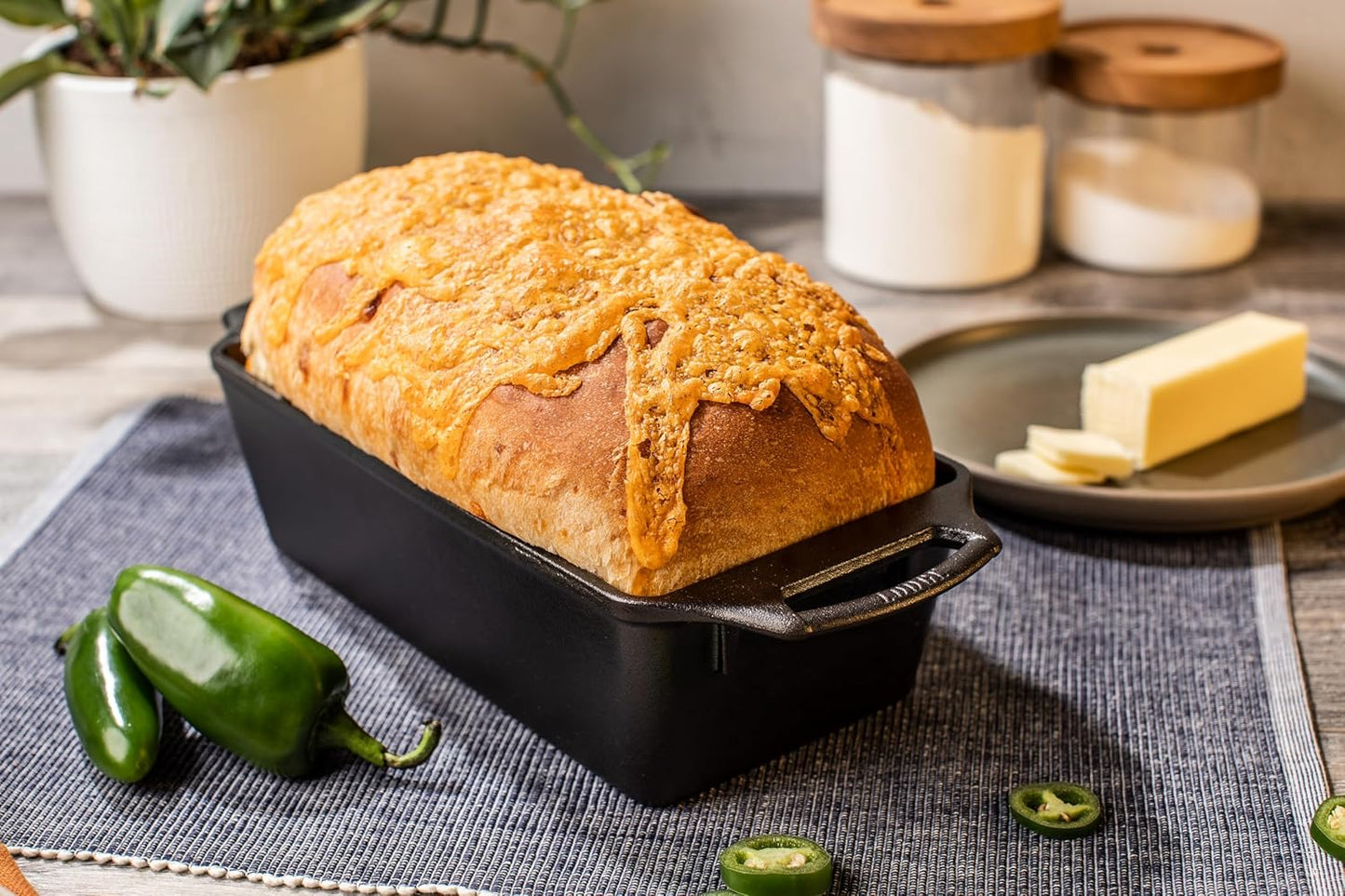 Lodge 10 Inch Pre-Seasoned Cast Iron Loaf Pan - Dual Handles - Unparalleled Heat Retention for Consistent, Even Baking - Black